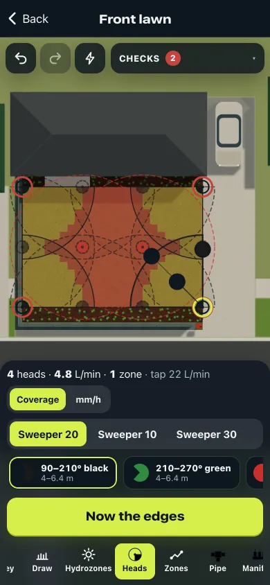 The real Heads station on the Front lawn job: four corner heads placed, the lawn red where it’s still dry and amber where one head reaches, the edge and middle heads still to place, and a Now the edges button.