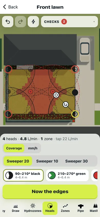 The Heads station on the Front lawn job: four corner heads placed, the lawn red where it’s still dry and amber where one head reaches, the edge and middle heads still to place as ghosts, and a Now the edges button.